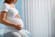 Pregnant woman sitting in a doctor's office